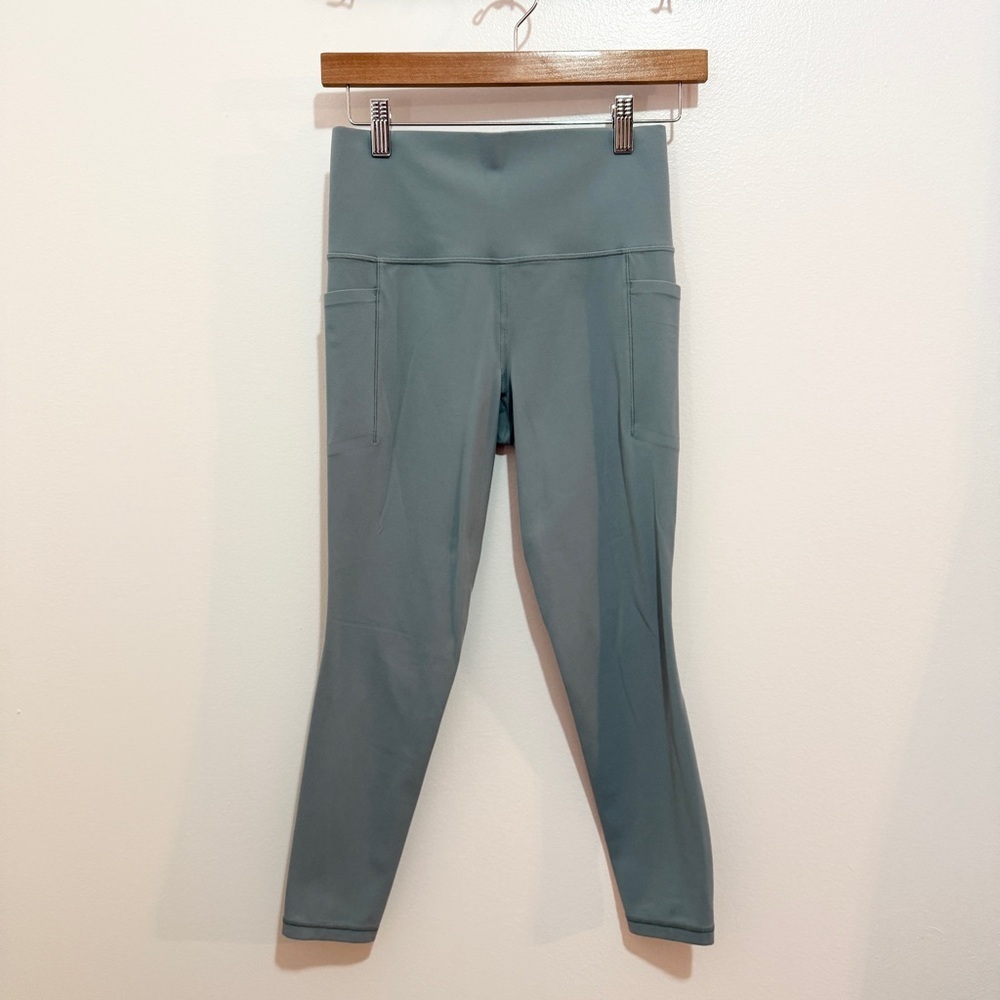 Athleta Salutation Stash‎ Pocket II 7/8 Leggings Small Blue